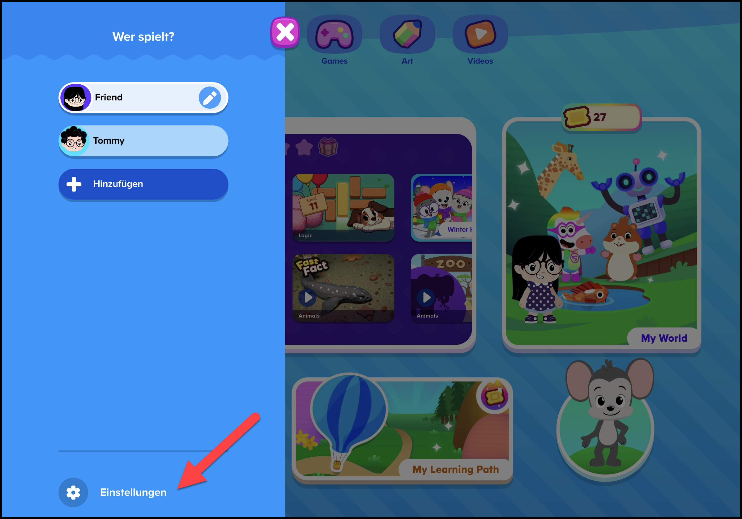 Deuthsch (German) ABCmouse 2 v1.53.0 pointing to the settings icon within the whos playing screen for premium users.png